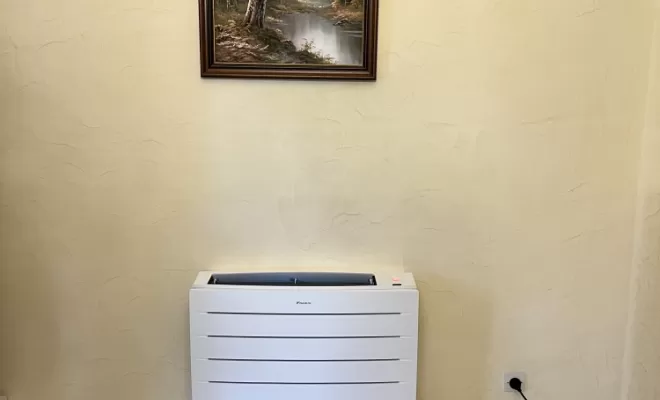 Unité intérieure de 5Kw en console installée dans le salon